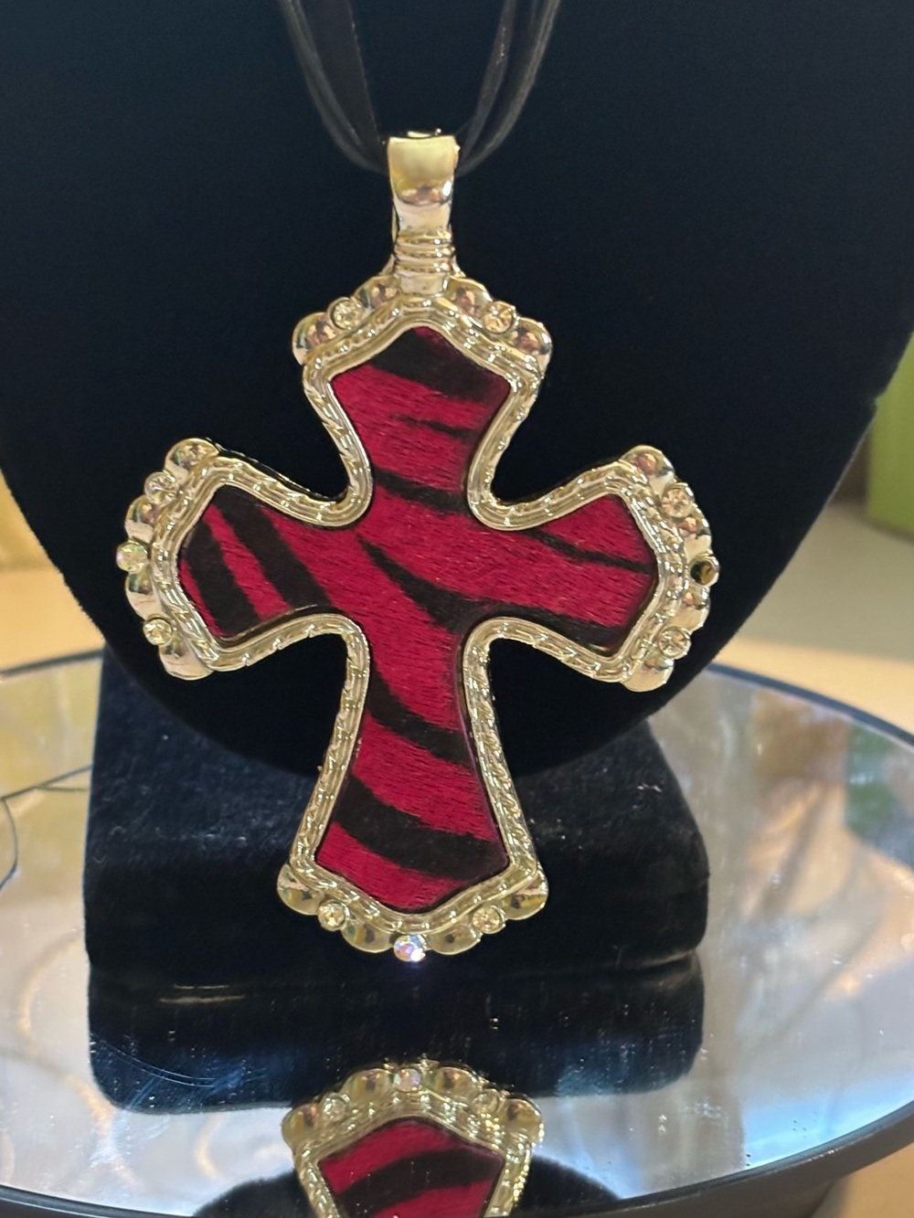 Western-style red faux zebra cross necklace